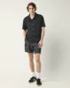 Floral Eyelet SS - Black sold by Corridor