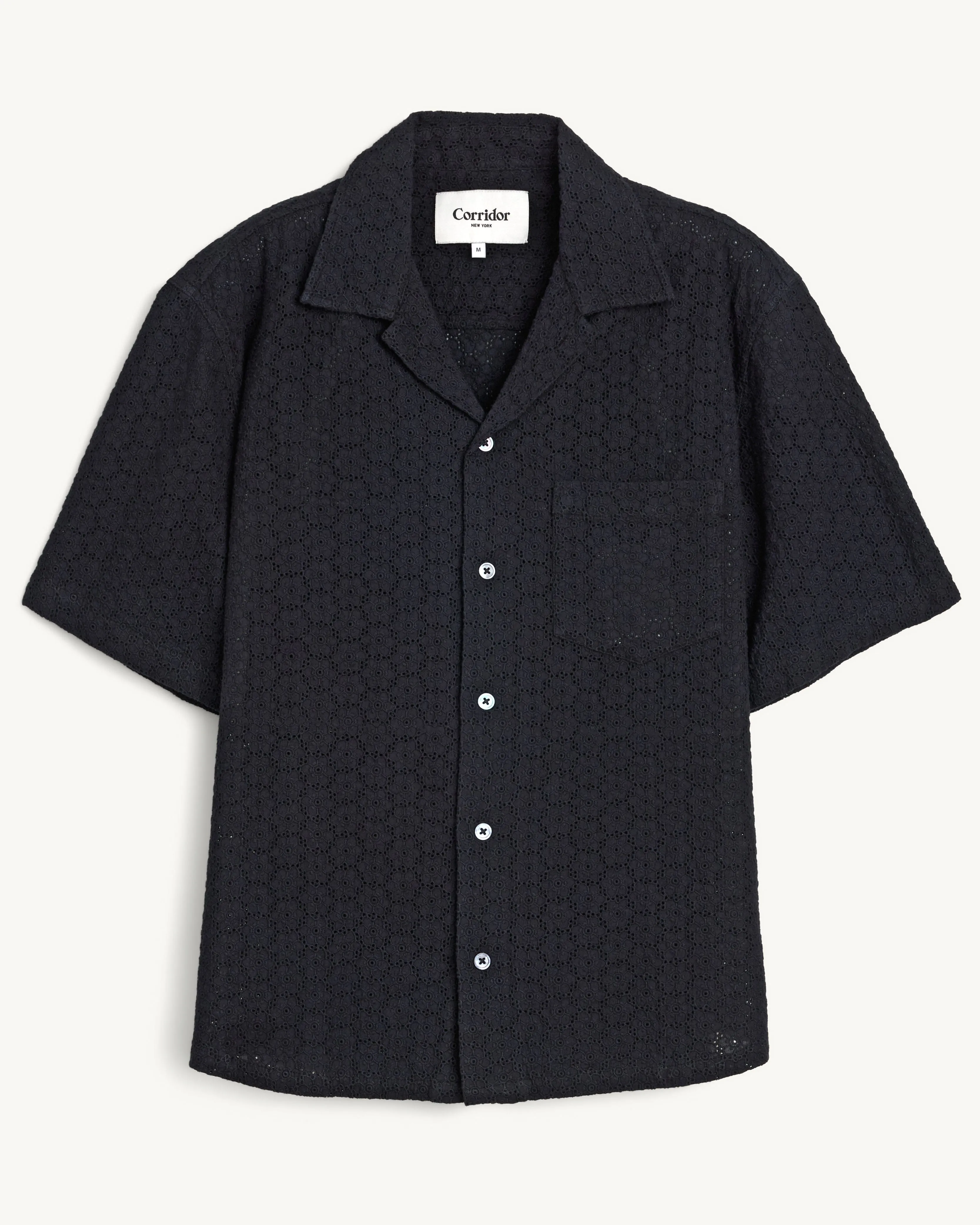 Floral Eyelet SS - Black sold by Corridor