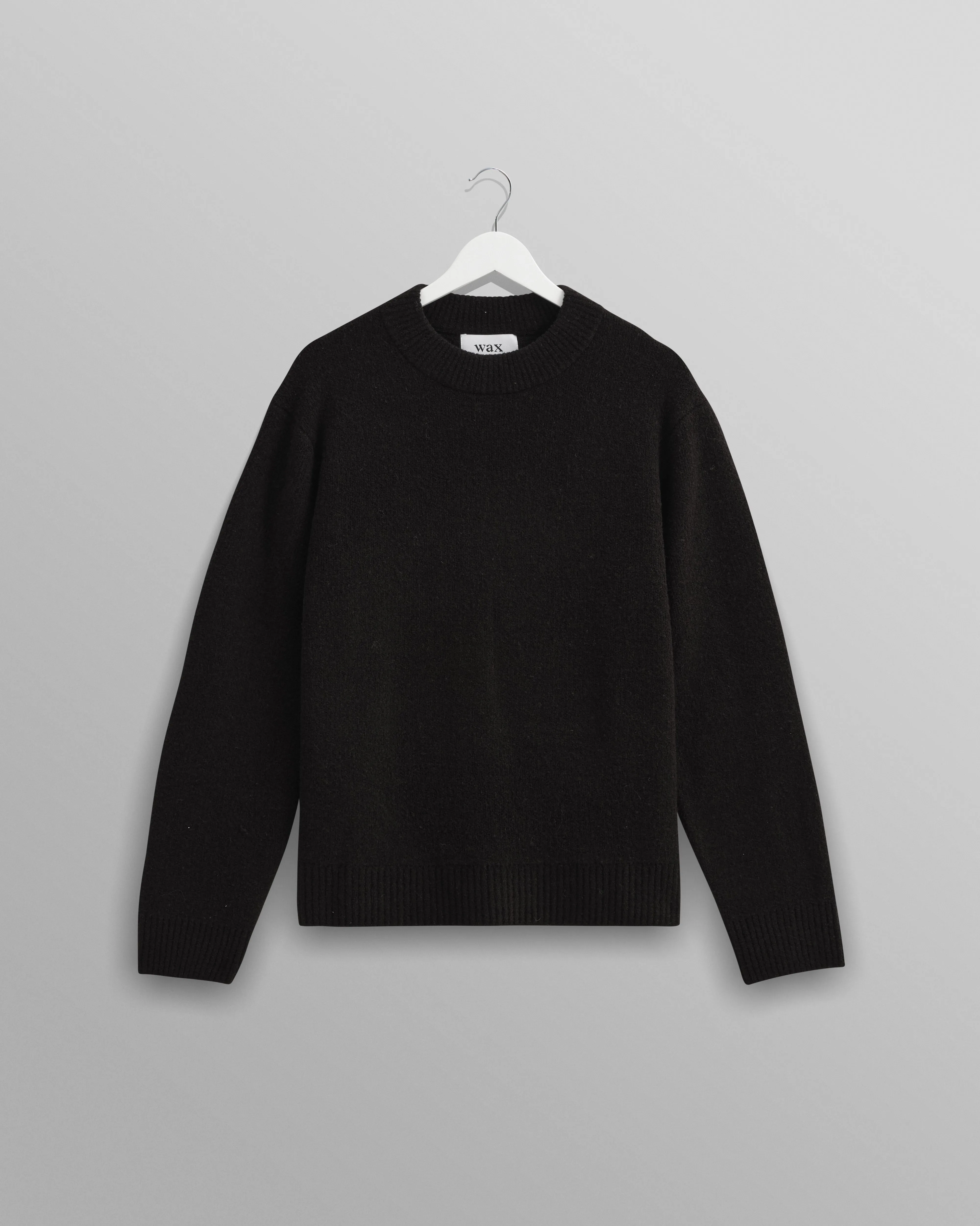 Wilde - Black Boucle Jumper sold by Wax London