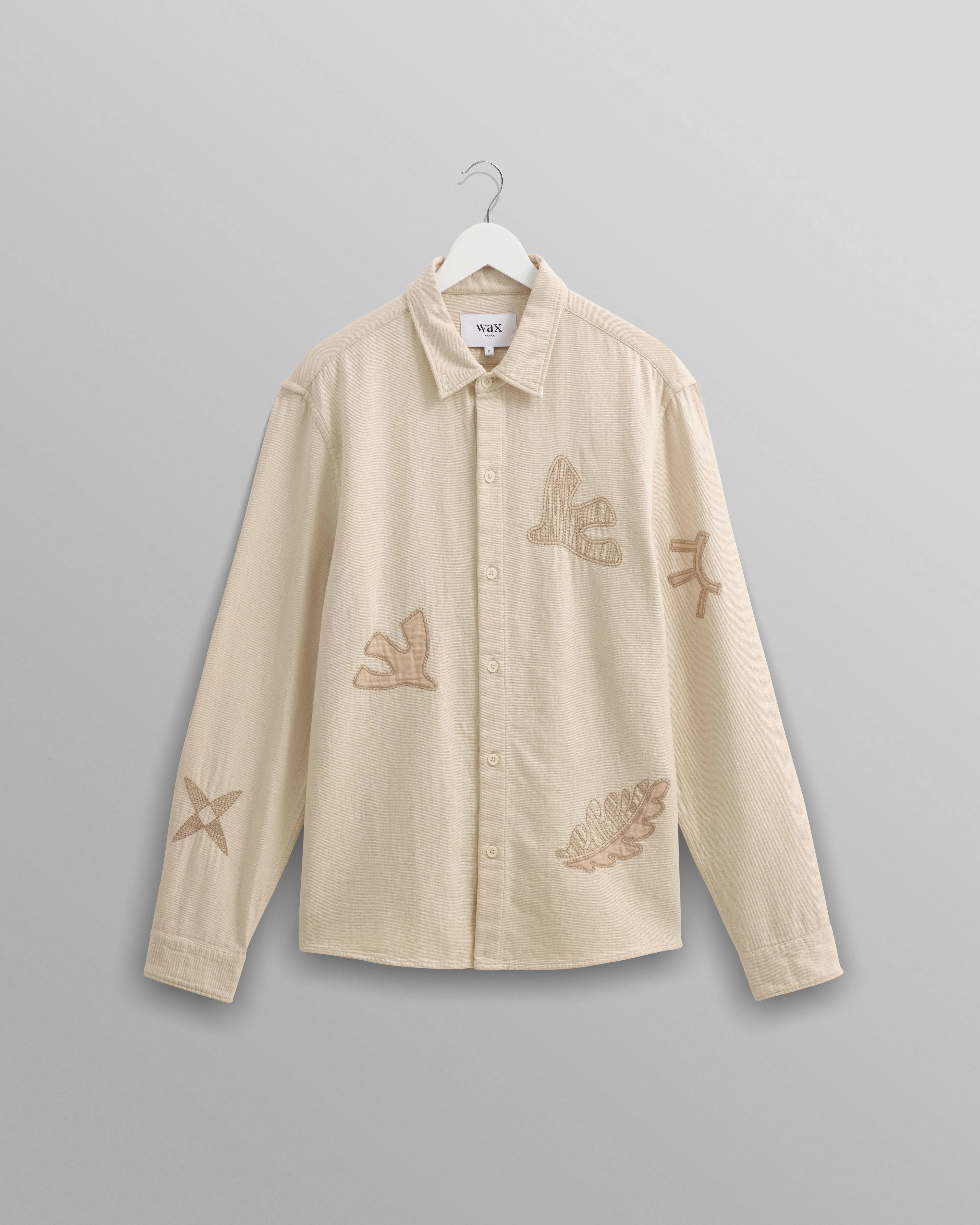 Trin - Ecru Doodle Applique Embroidered Shirt sold by Wax London