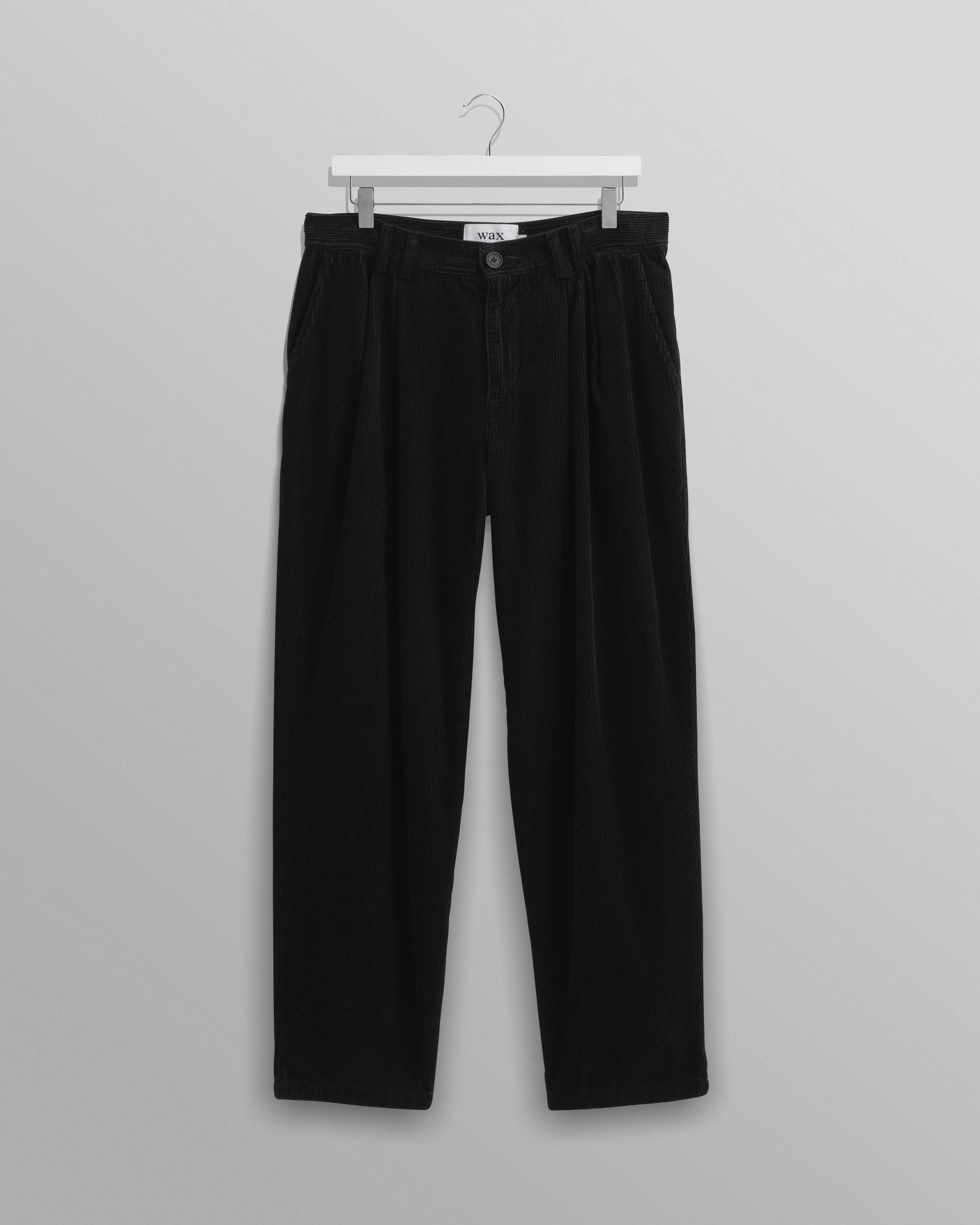 Raleigh - Black Corduroy Pleated Trousers sold by Wax London