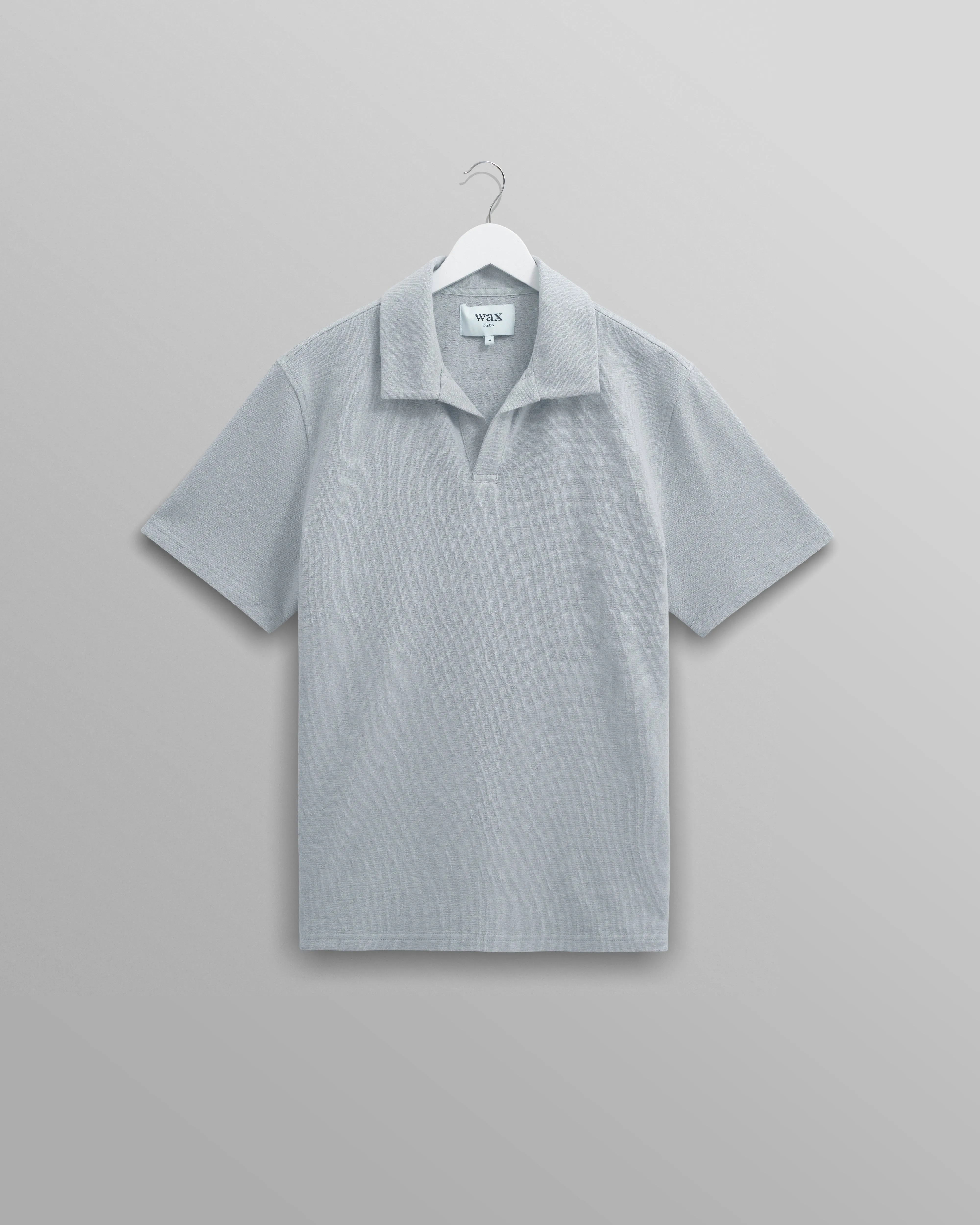 Atwood - Blue Textured Organic Cotton Polo Shirt sold by Wax London