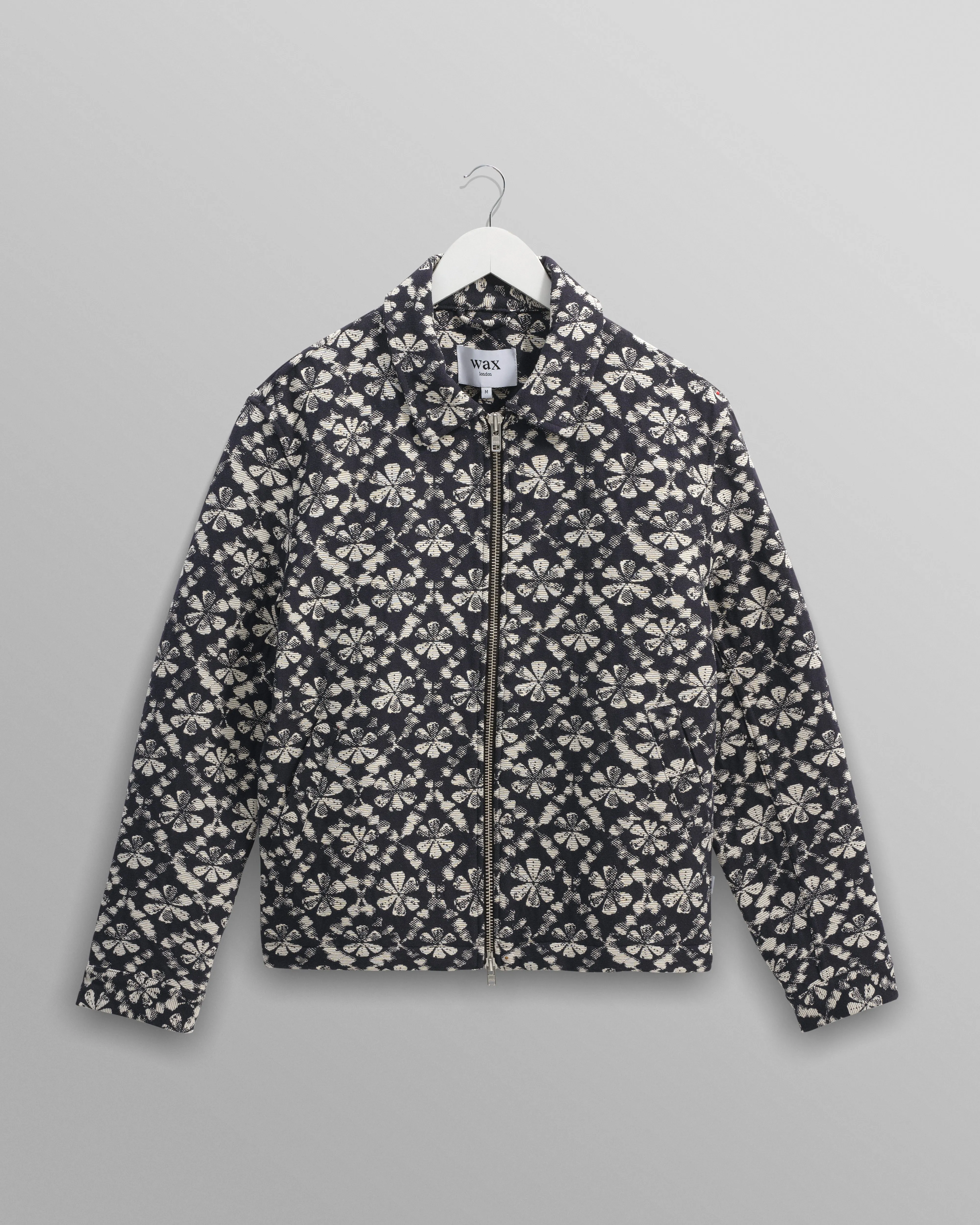 Eldon - Navy Flower Stamp Jacquard Jacket sold by Wax London