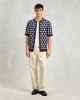 Porto - Navy Splash Crochet Knitted Polo Shirt sold by Wax London