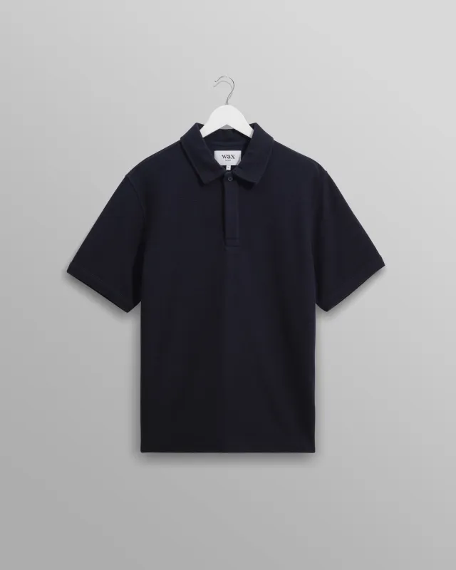 Shore - Navy Textured Organic Cotton Polo Shirt made by Wax London