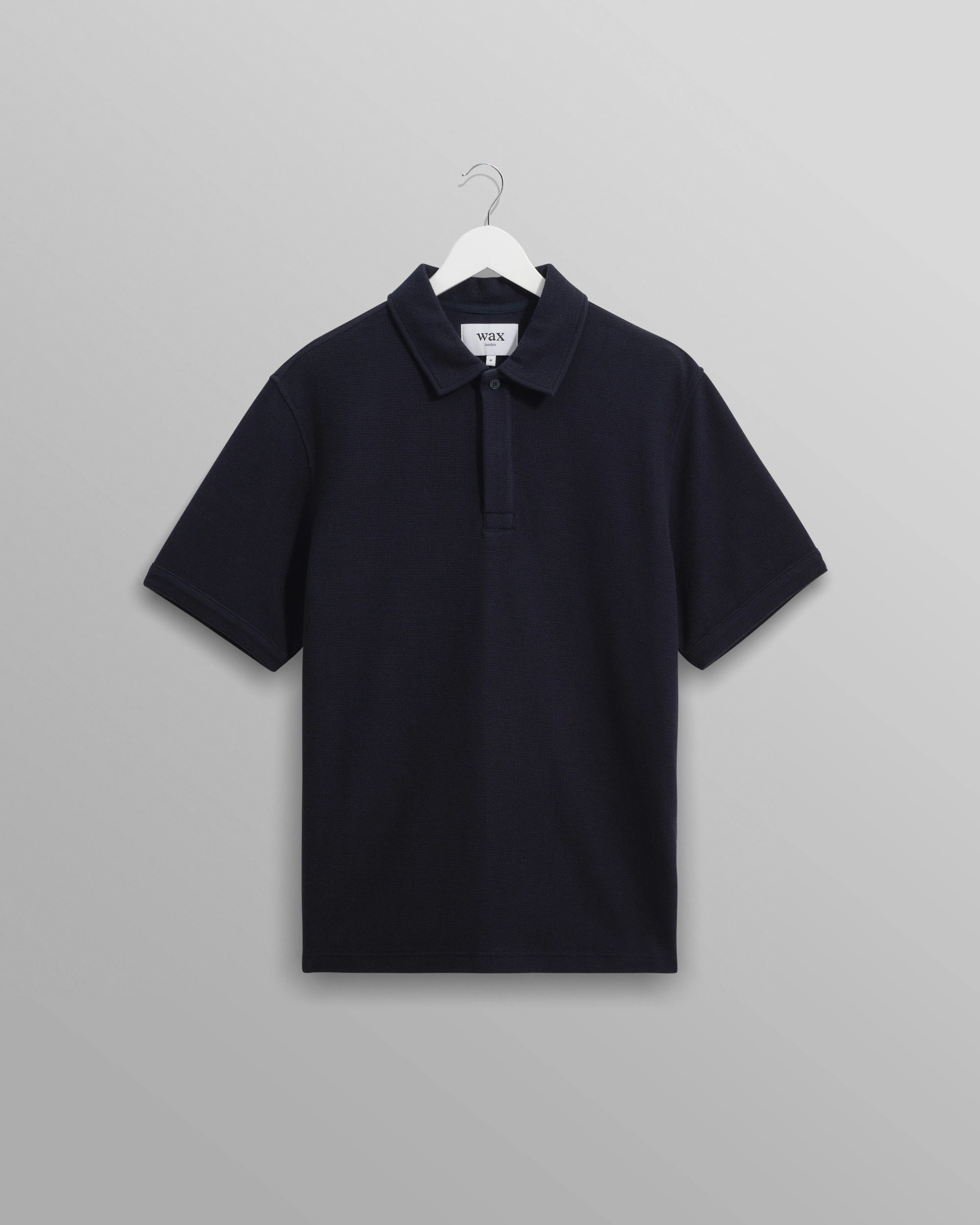 Shore - Navy Textured Organic Cotton Polo Shirt sold by Wax London