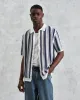 Porto - Blue And Ecru Stripe Crochet Knitted Polo Shirt sold by Wax London
