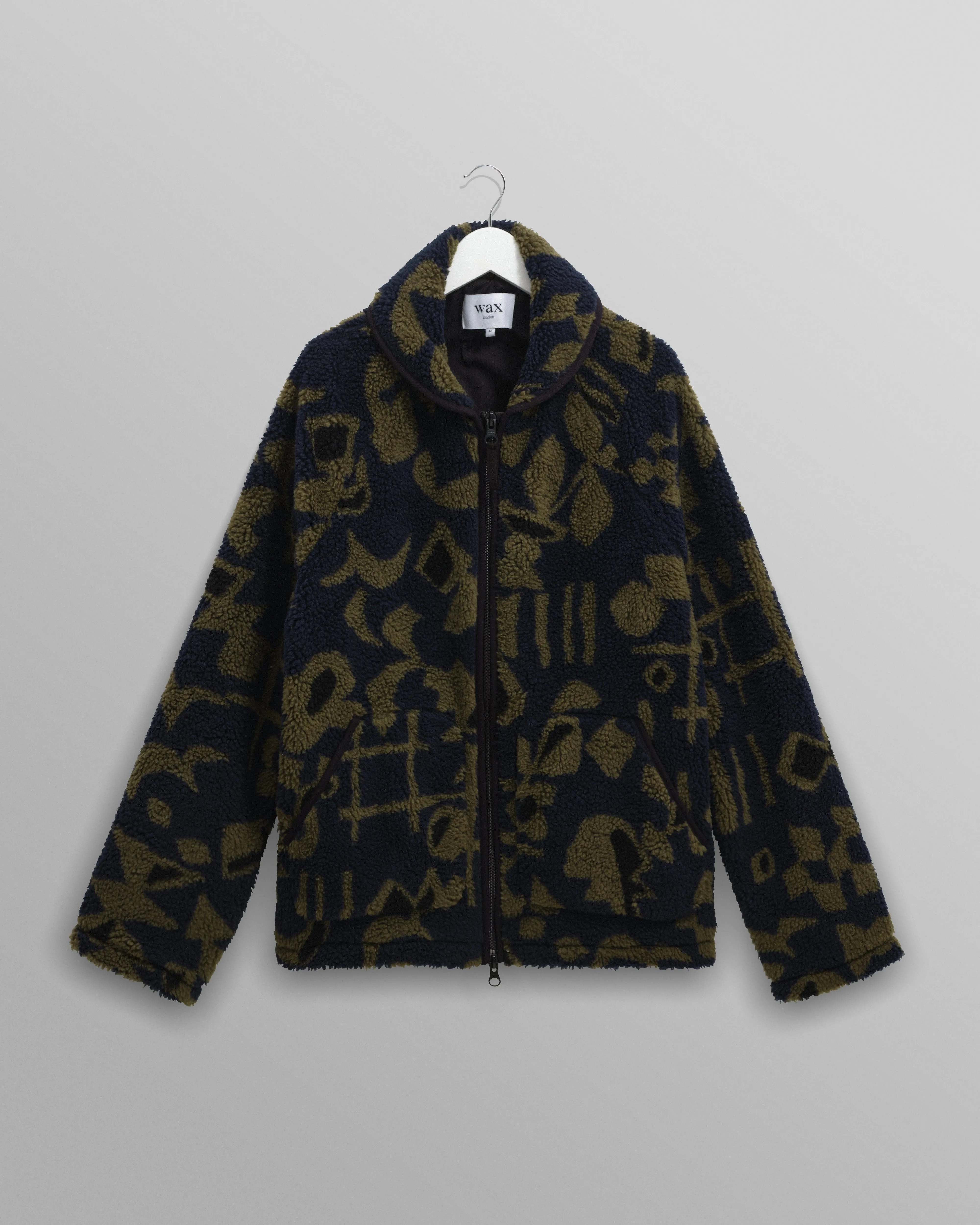 Tate - Navy And Khaki Shapes Jacquard Fleece Jacket sold by Wax London