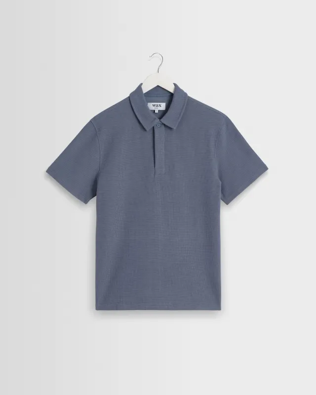 Shore - Mid Blue Textured Short-Sleeve Polo Shirt made by Wax London