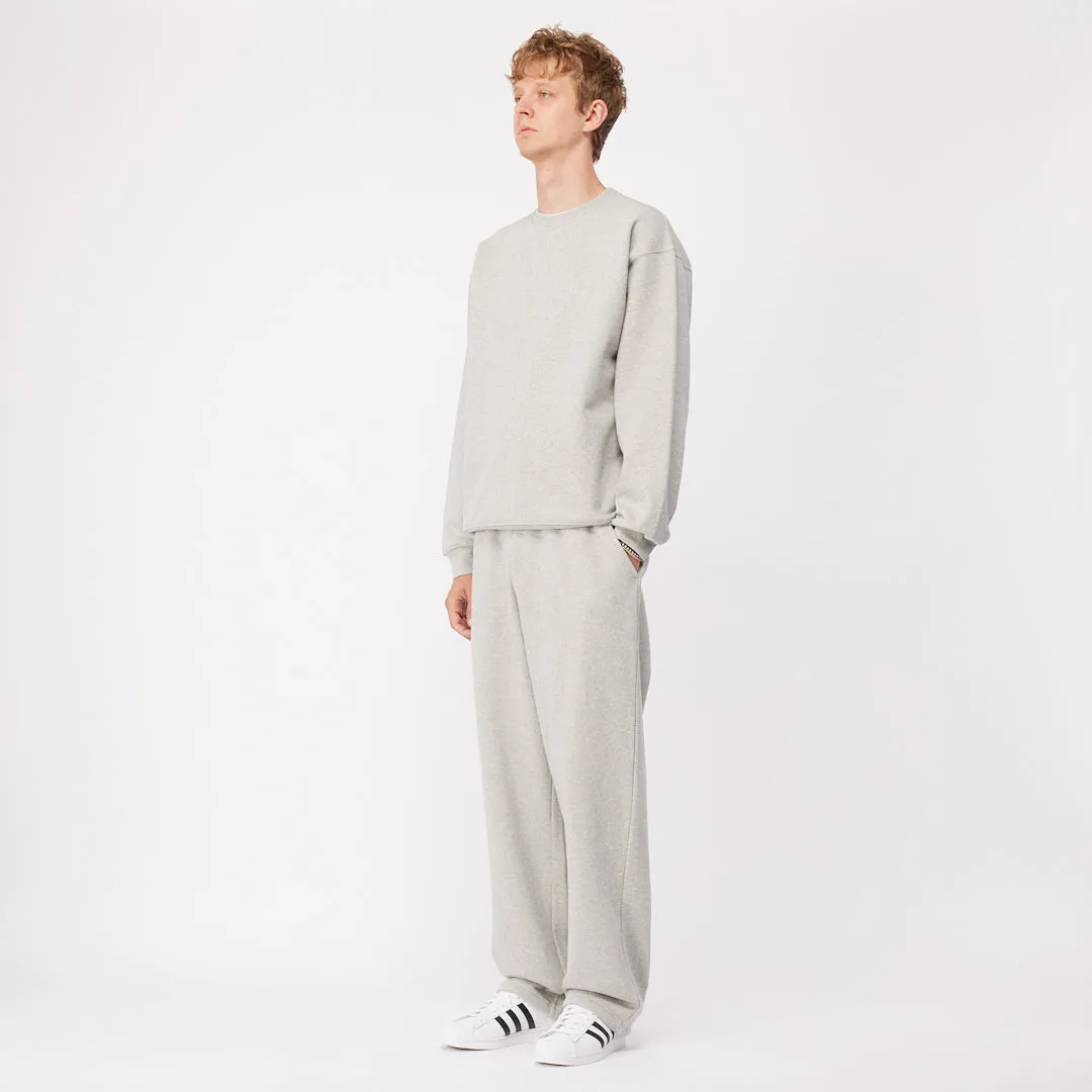 Cursive Small Logo Sweatpants sold by Dime