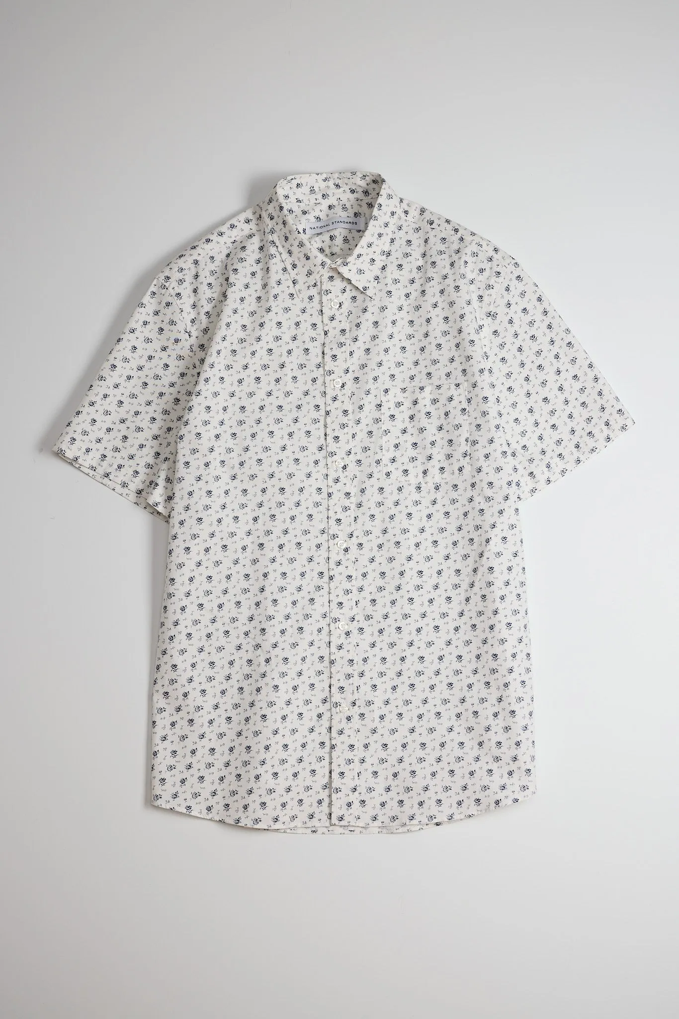 NS1146-89 Japanese Rose Print in White sold by National Standards