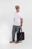 Mexico Triangle Tote - Black sold by Manyana