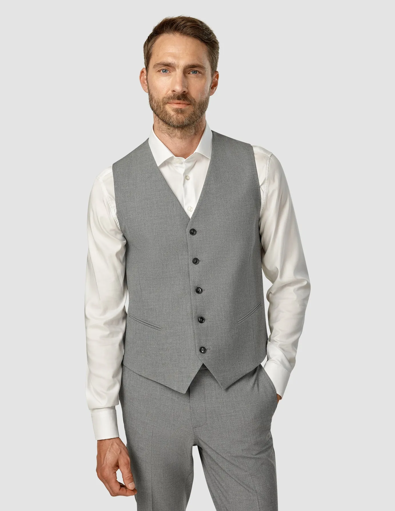 Essential Vest Dark Grey Melange sold by Shaping New Tomorrow