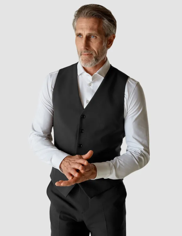 Essential Vest Dark Shadow sold by Shaping New Tomorrow