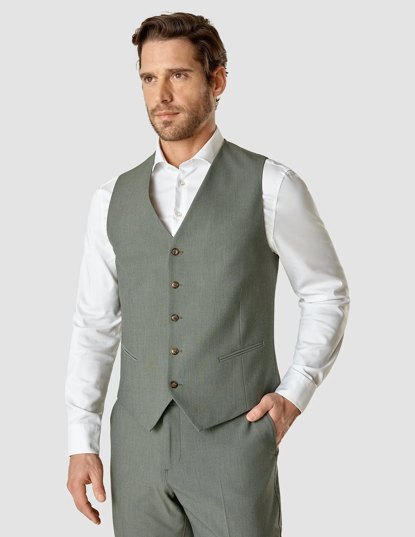 Essential Vest Green Melange sold by Shaping New Tomorrow