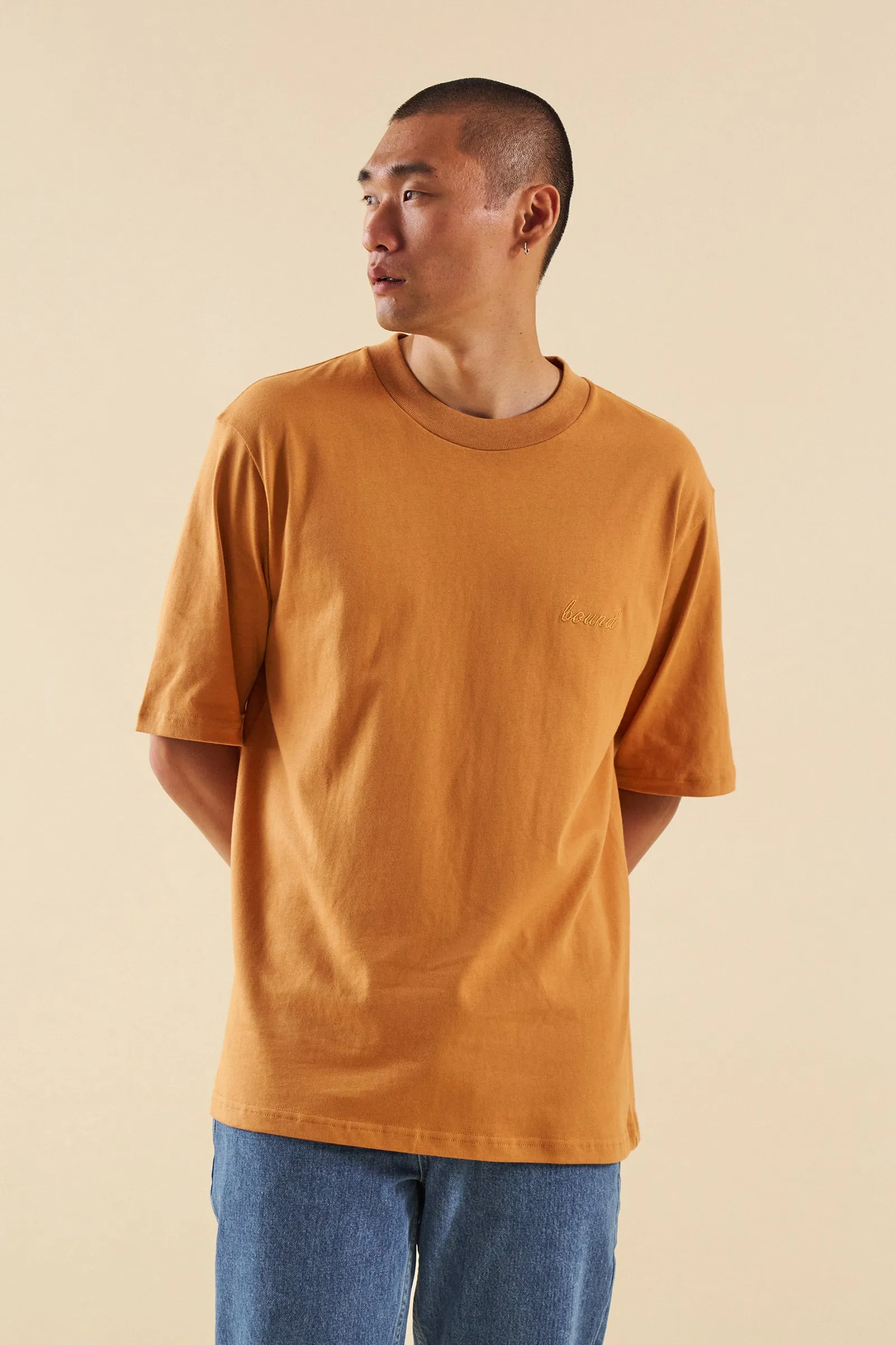 BURNT ORANGE SCRIPT TEE sold by Bound