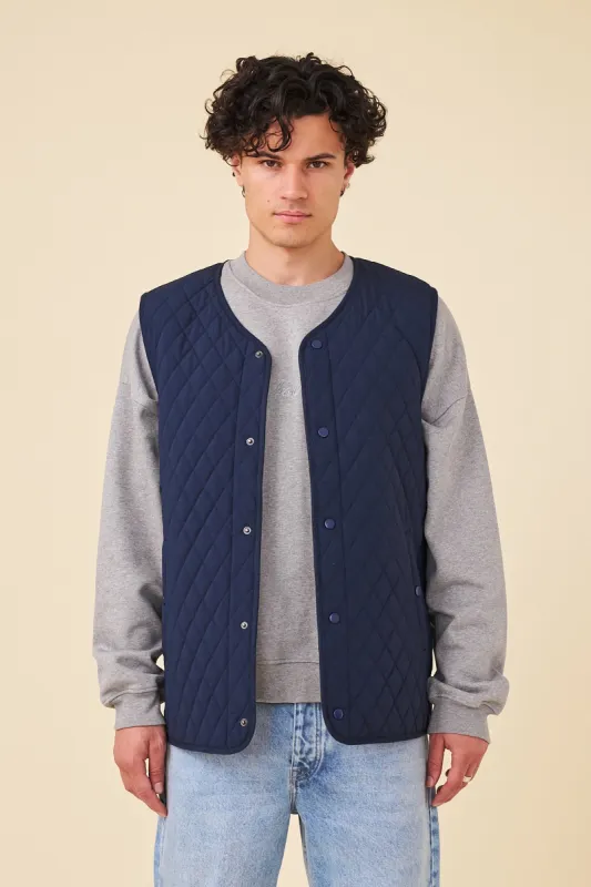 CHELSEA QUILTED VEST - NAVY sold by Bound