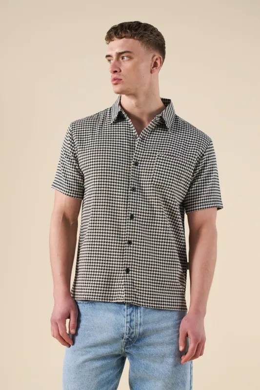 DOGTOOTH WOVEN POLO - BLACK sold by Bound