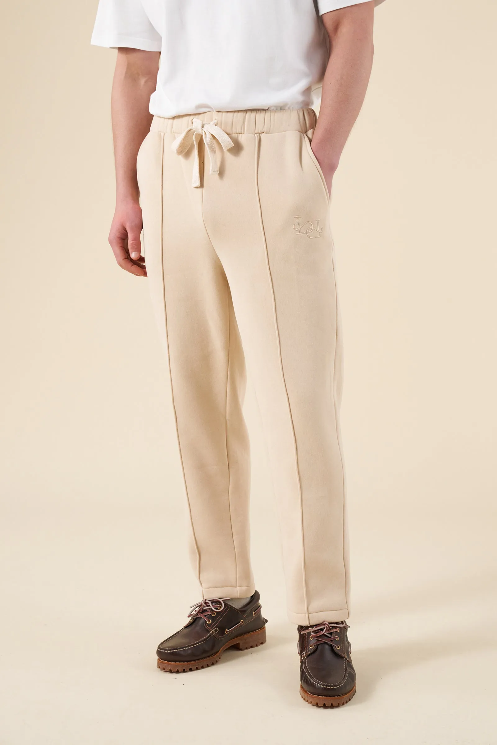 CUFFLESS PLEAT JOGGERS - CREAM sold by Bound