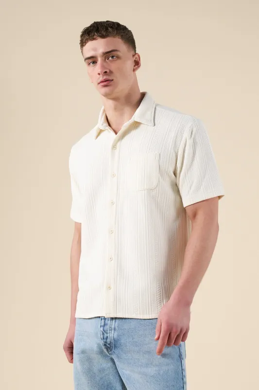 CABLE KNIT WOVEN POLO - ECRU sold by Bound