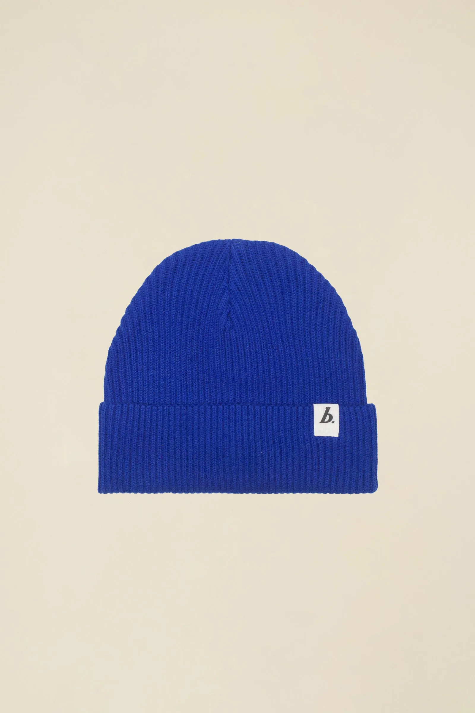 ORGANIC FISHERMAN RIBBED LABEL BEANIE - BLUE sold by Bound