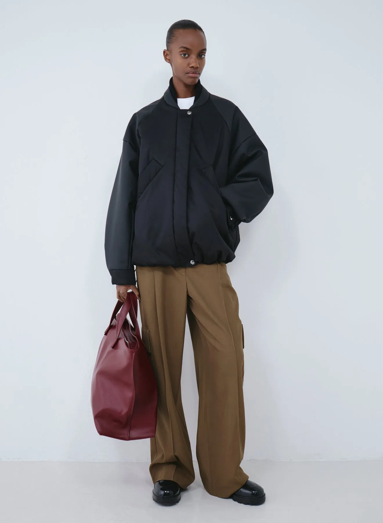 Oversized bomber rubber | black sold by KASSL Editions