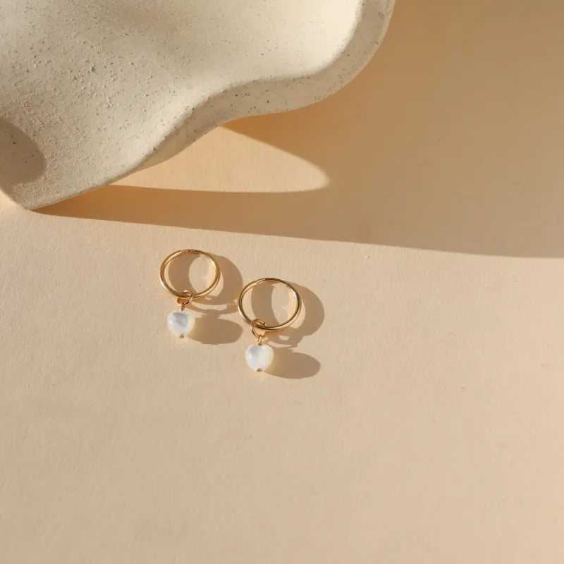 Luminous Heart Hoops made by Token Jewelry