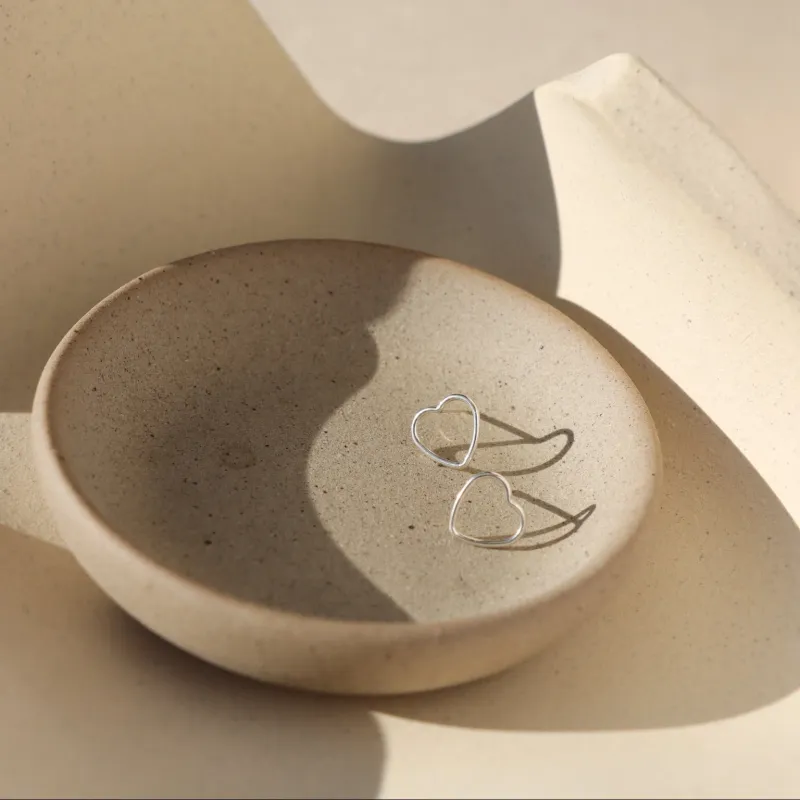 Open Heart Studs sold by Token Jewelry