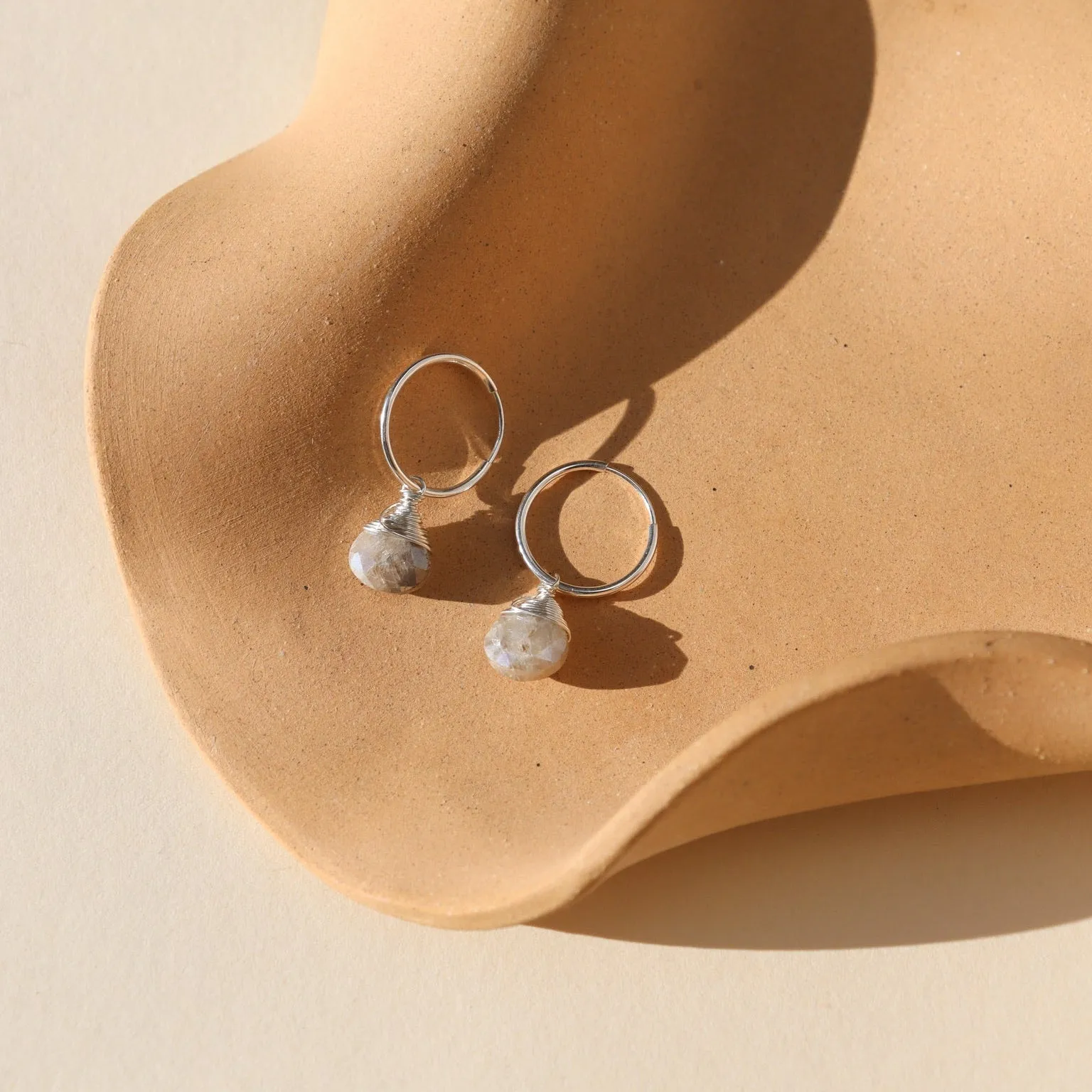 Mystic Moonstone Hoops sold by Token Jewelry