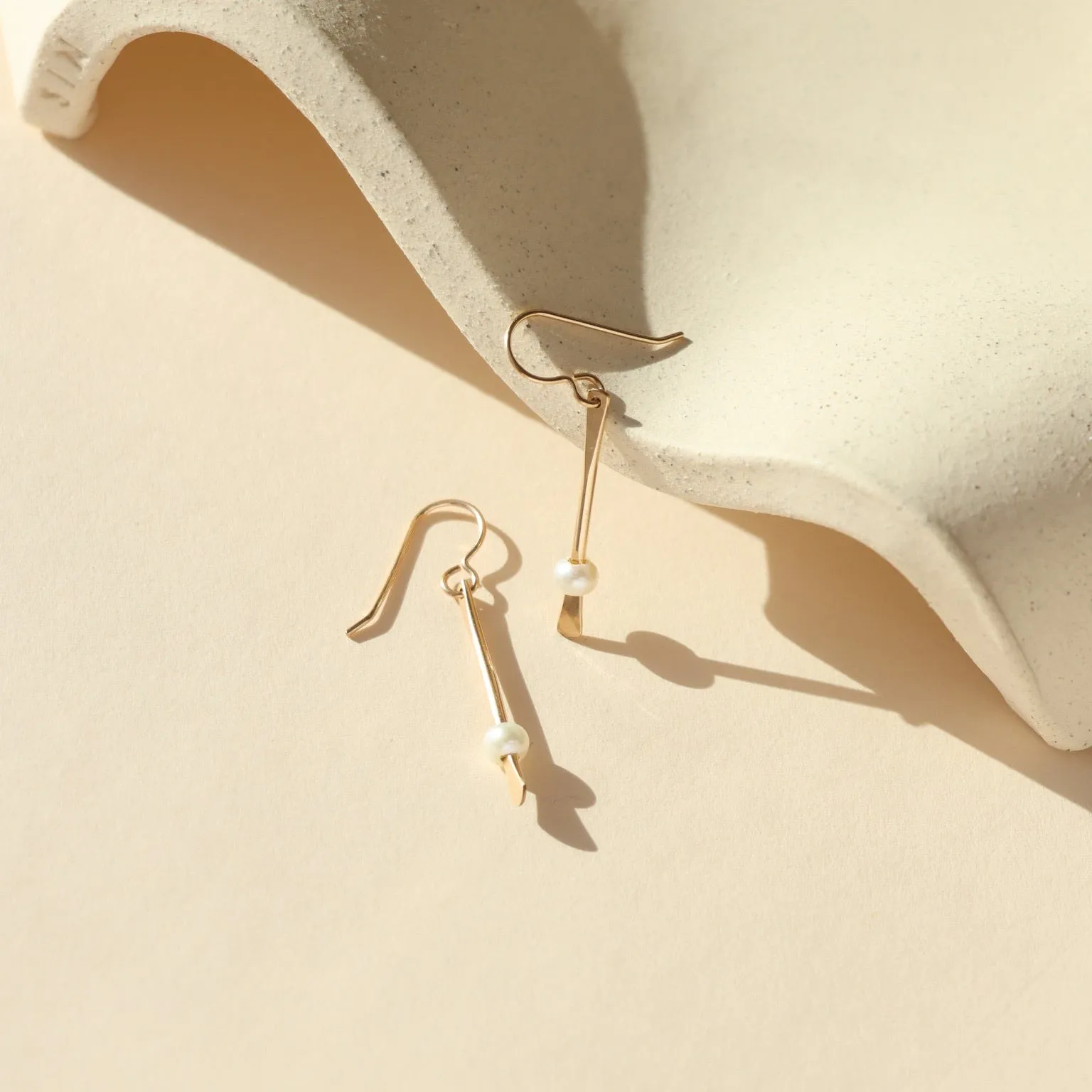 Threaded Pearl Earrings sold by Token Jewelry