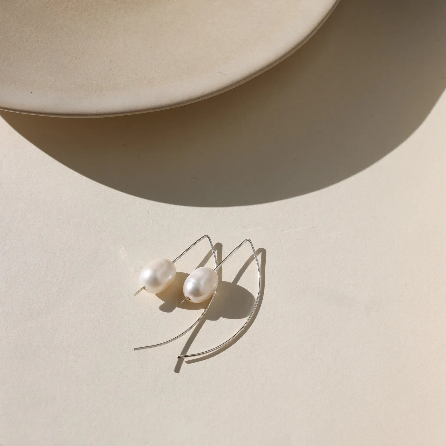 Half Moon Pearl Earrings sold by Token Jewelry