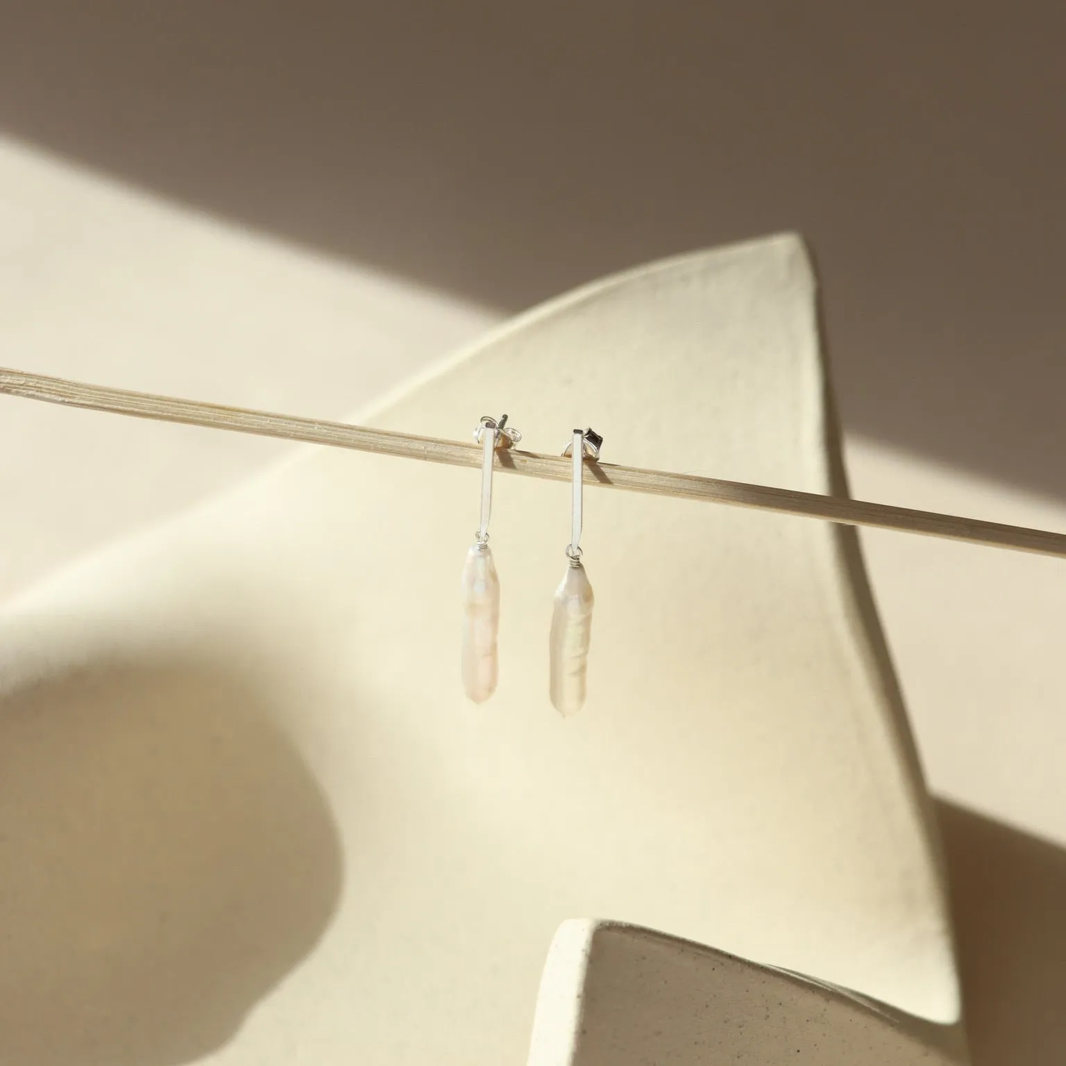 Trace Earrings sold by Token Jewelry