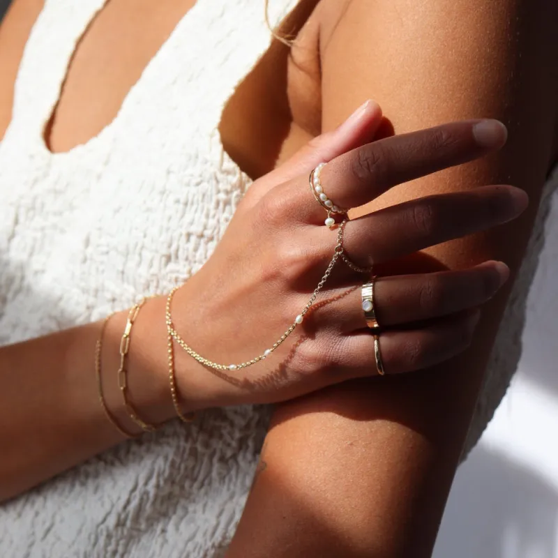 Gemini Hand Chain with Pearl sold by Token Jewelry