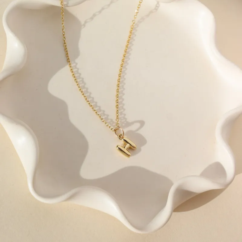 Tiny Bubble Initial Charm Necklace sold by Token Jewelry