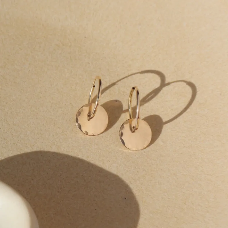 Coin Hoops sold by Token Jewelry