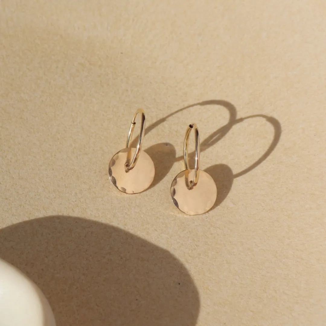 Coin Hoops sold by Token Jewelry