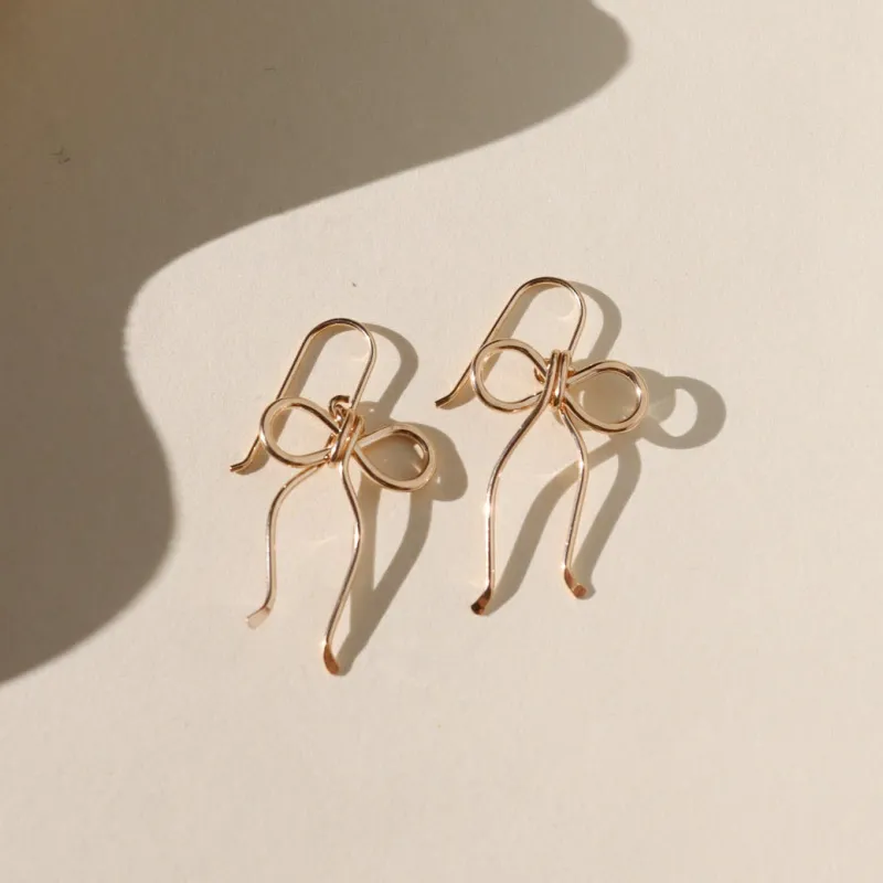Coquette Bow Earrings made by Token Jewelry