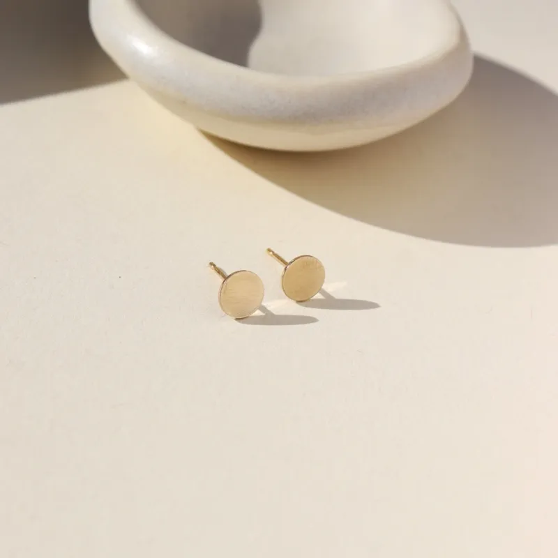 Circle Studs sold by Token Jewelry