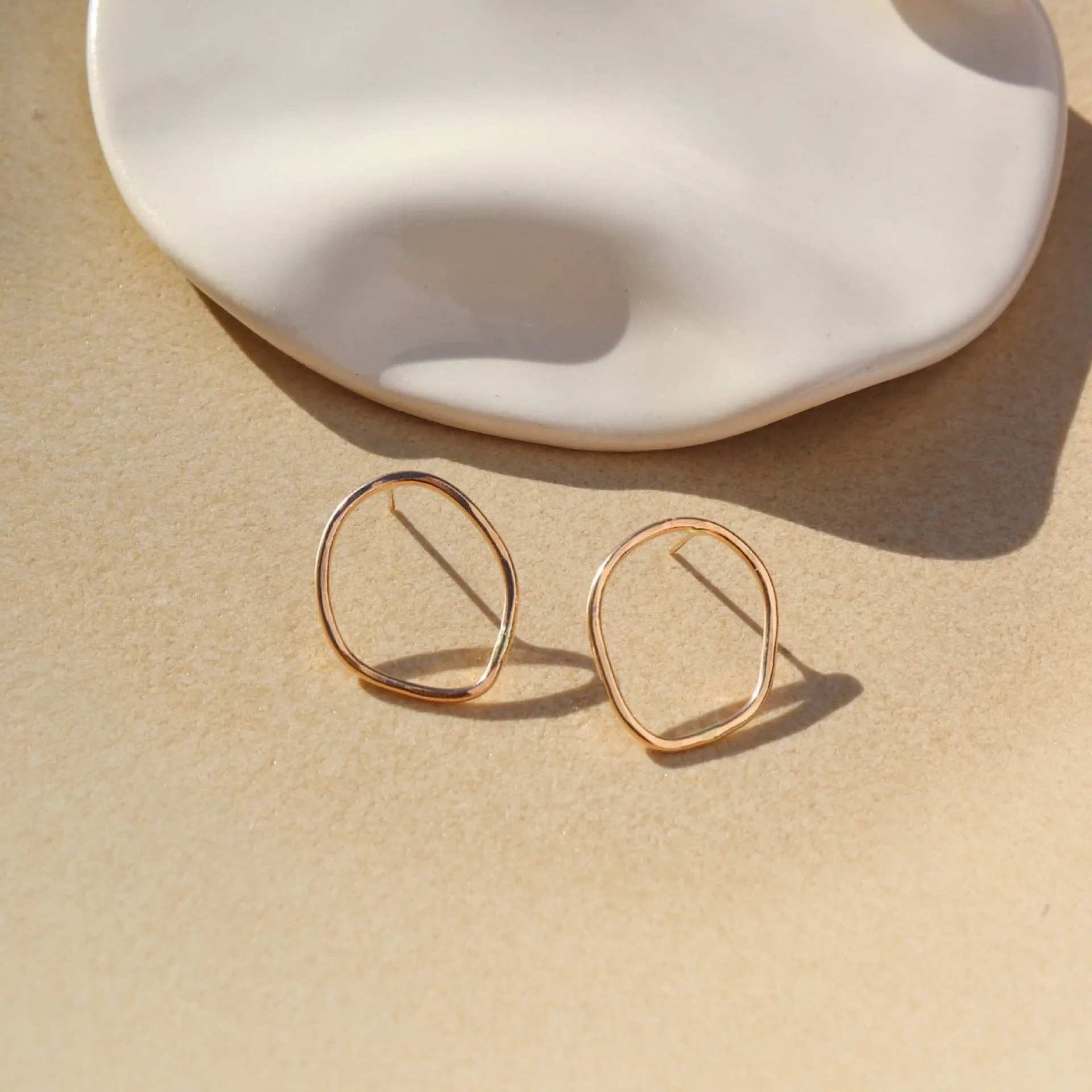 Form Studs sold by Token Jewelry