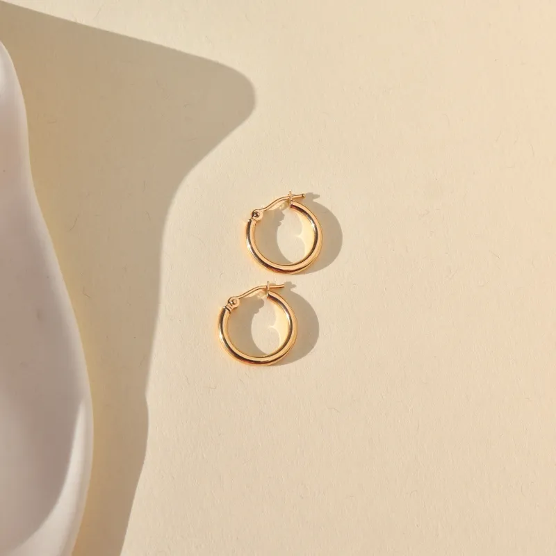 Classic Hoops in 14k Gold sold by Token Jewelry