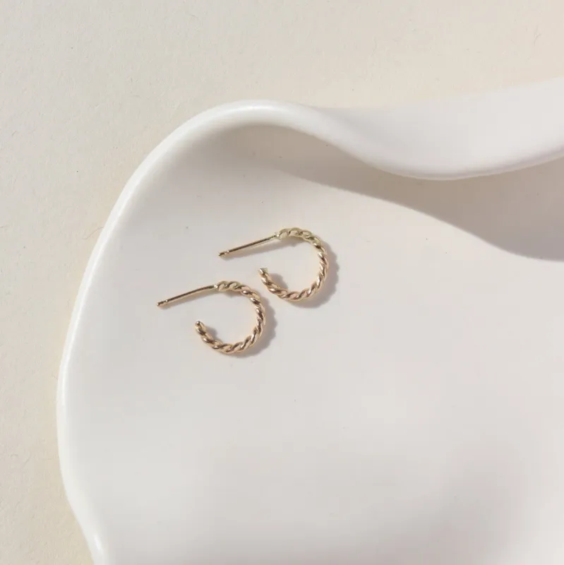 Spiral Hoops sold by Token Jewelry