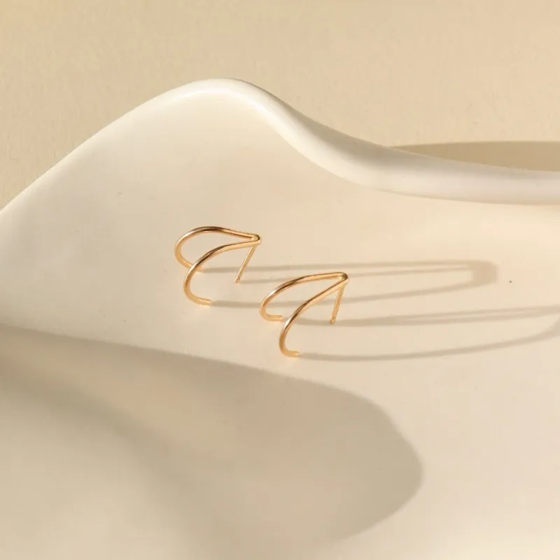 Wishbone Studs sold by Token Jewelry