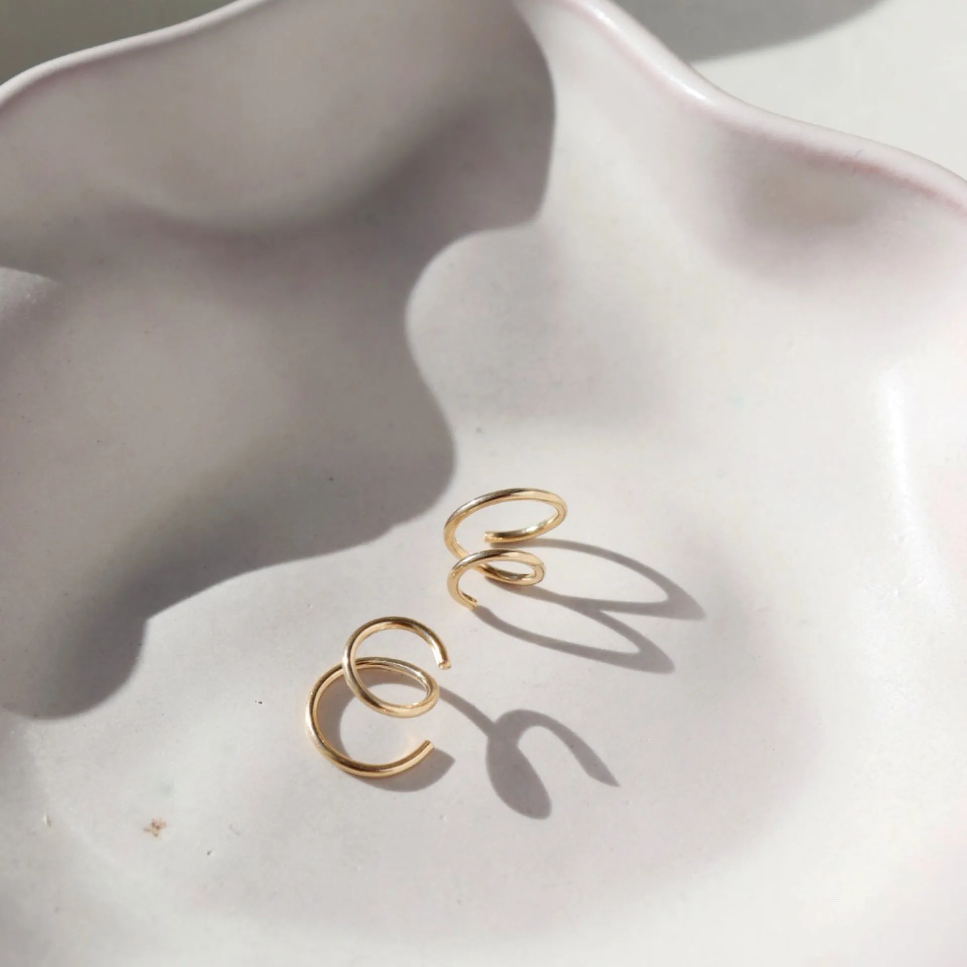Mini Twists in 14k Gold sold by Token Jewelry