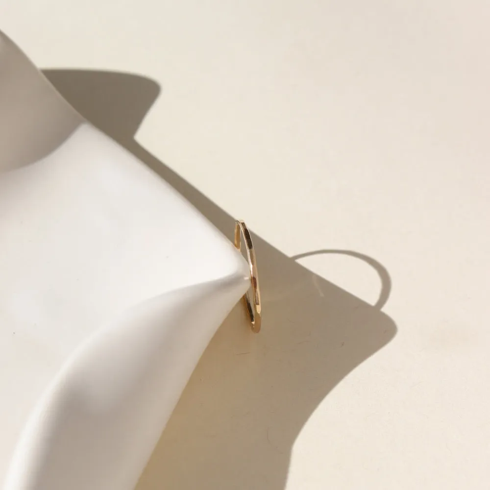Simple Band in 14k Gold sold by Token Jewelry