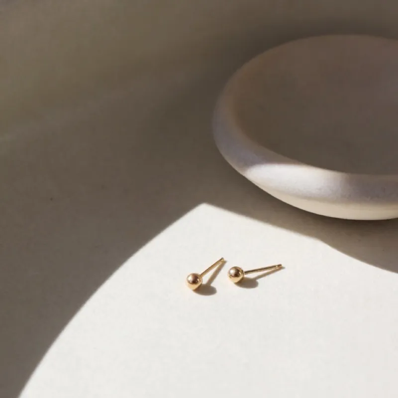 Classic Studs in 14k Gold sold by Token Jewelry