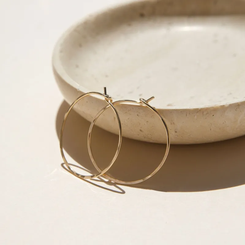 Organic Hoops sold by Token Jewelry