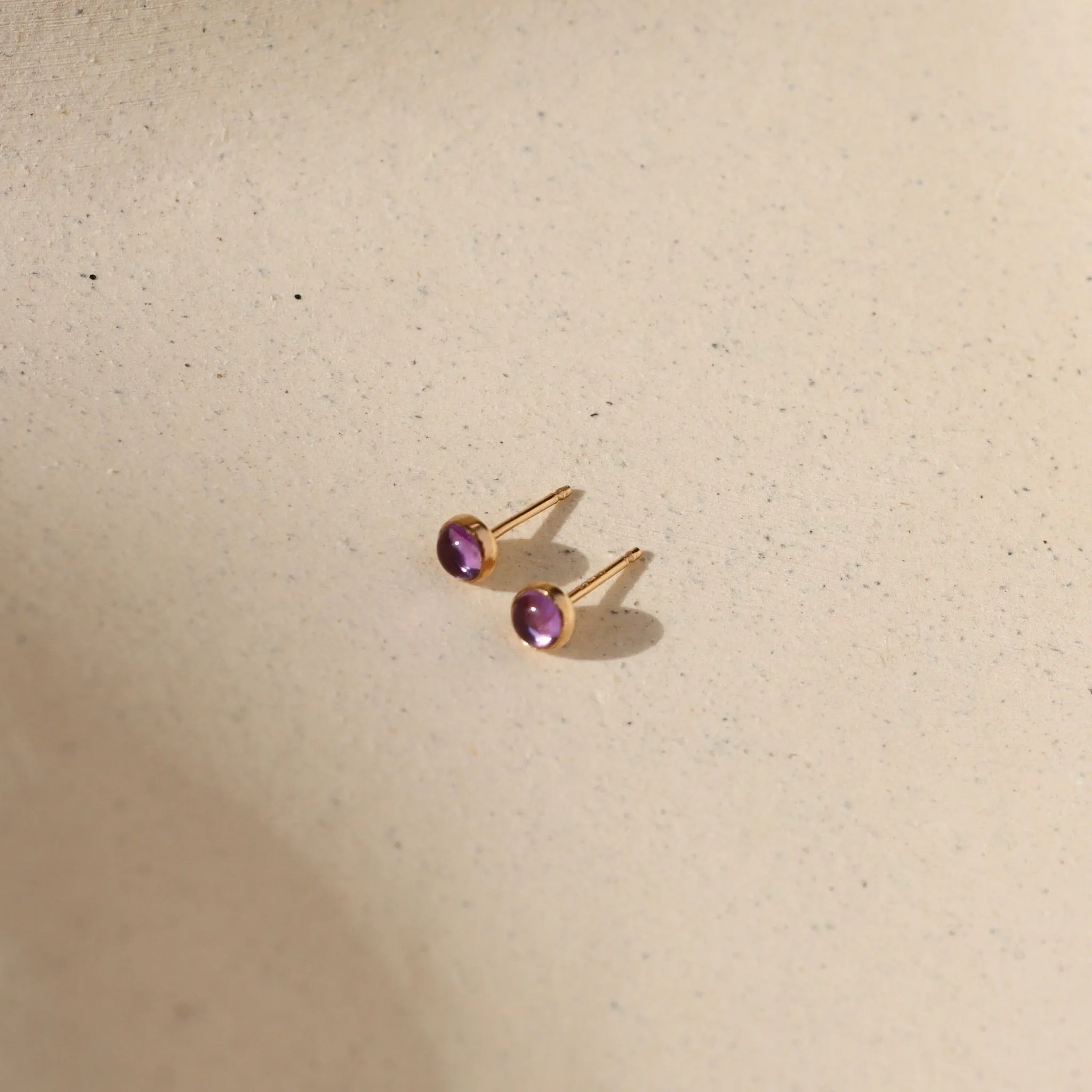Amethyst Studs sold by Token Jewelry