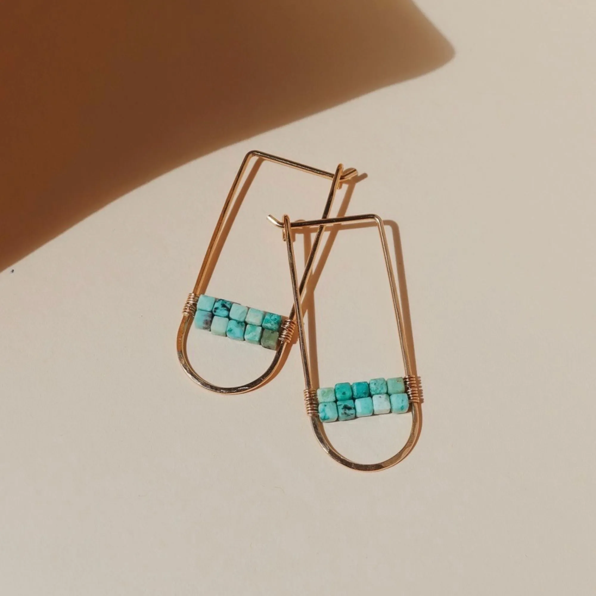 Birdie Hoops sold by Token Jewelry