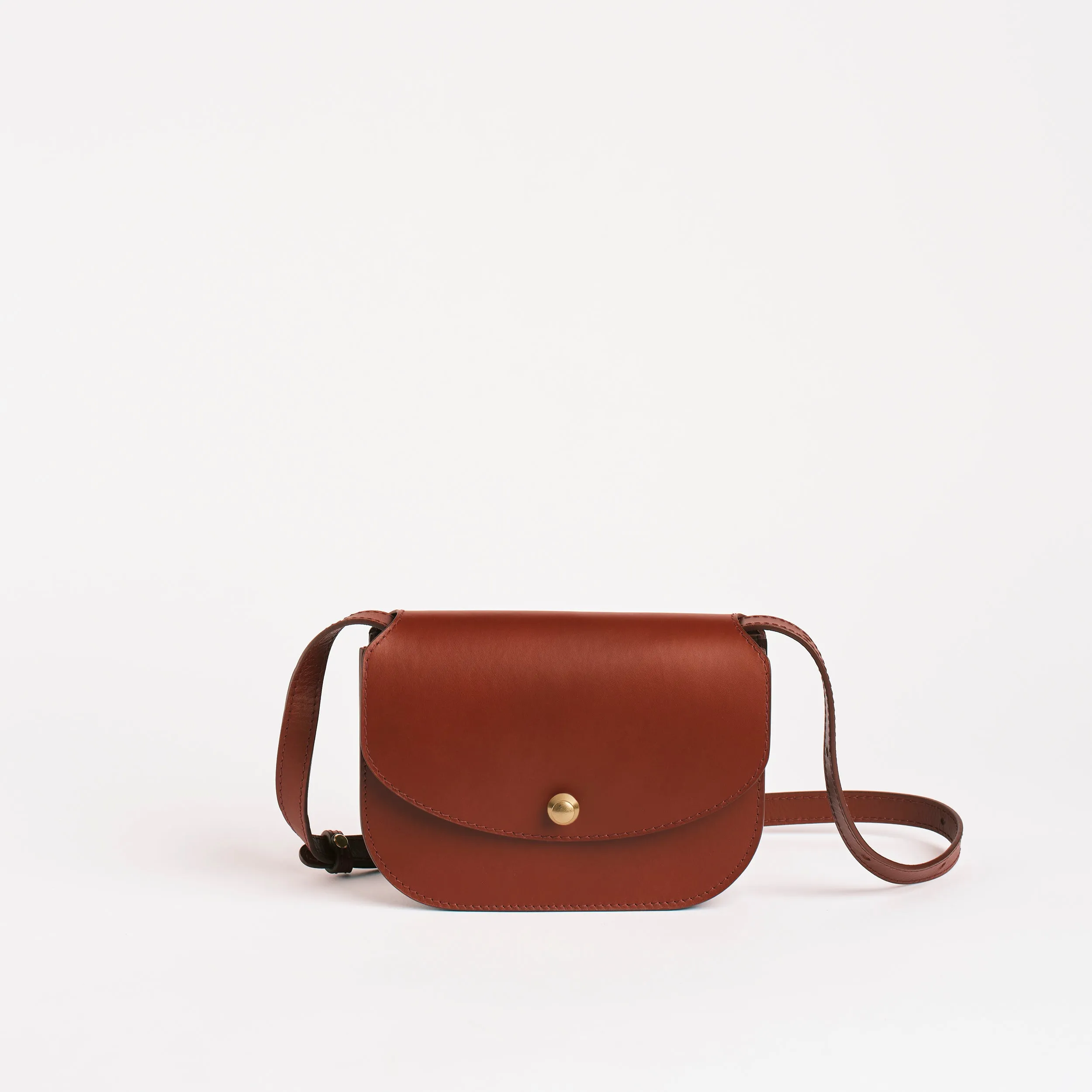 Po in Brick Vachetta sold by LINDQUIST