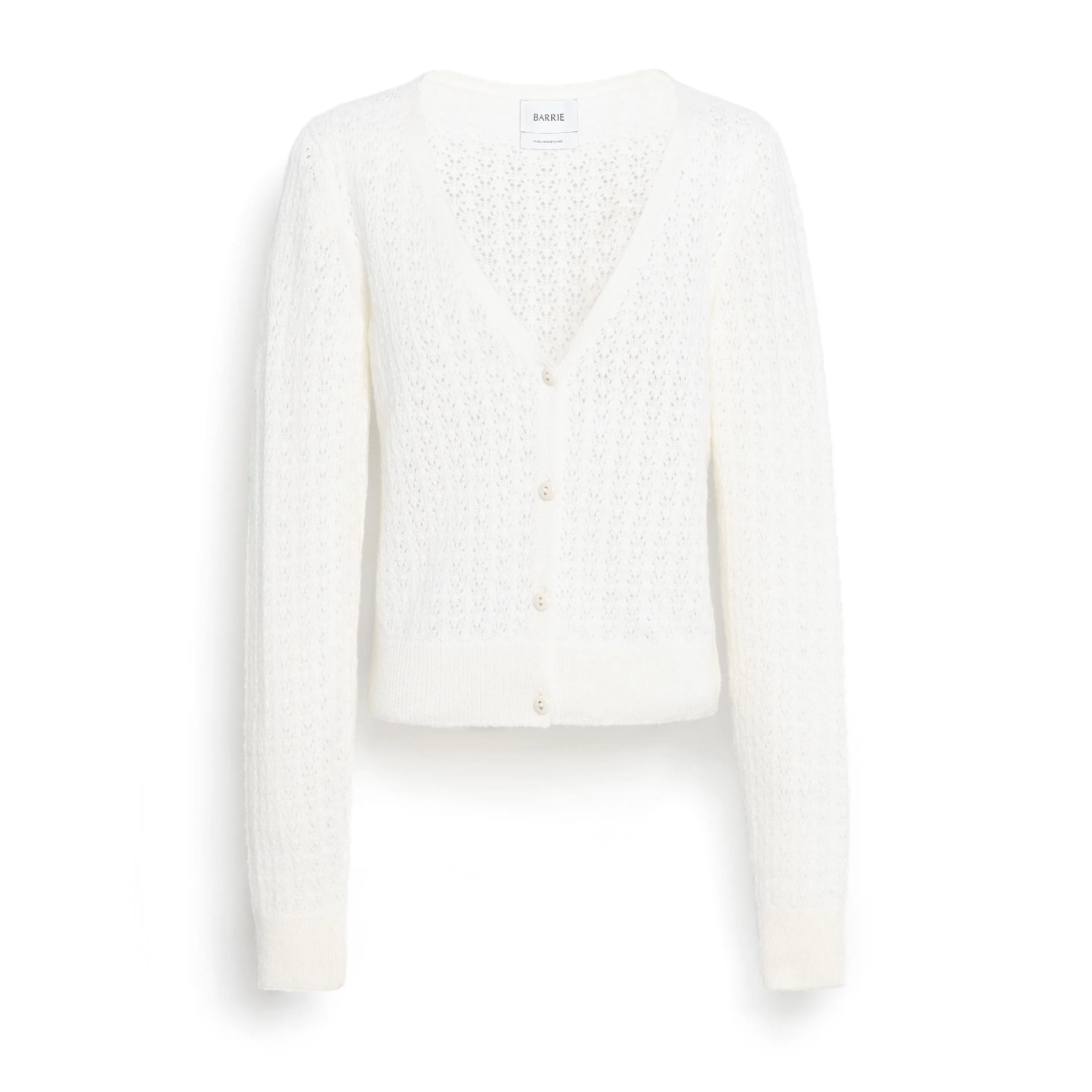 Cardigan en dentelle cachemire sold by Barrie